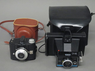 A Haminex 35HS compact camera, a Ashica Electro 35 GL  camera, a Bell & Howel autoload camera and a pair of  Panoramic binoculars