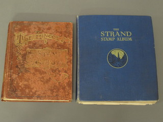 A blue Standard stamp album and a red Lincoln stamp album  containing a collection of World stamps