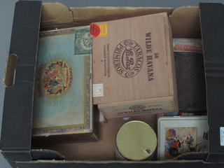 A box containing a collection of various vintage cigars