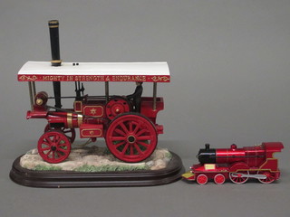 A model of a traction engine and a model locomotive