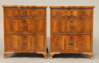 A handsome pair of 19th Century figured walnut apprentice  commodes of serpentine outline fitted 3 long drawers, raised on  ogee bracket feet 10"  ILLUSTRATED