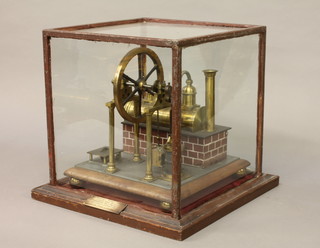 A 19th Century working model of a steam saw bench awarded  Gold Medal at the 1851 Great Exhibition Hyde Park contained in  a glazed display case with plaque 14"   ILLUSTRATED