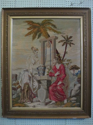 A Victorian Berlin woolwork picture "Christ and Ruth at the  Well" 34 1/2" x 26" contained in a decorative gilt frame