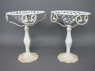A pair of circular pierced iron pedestals 18"