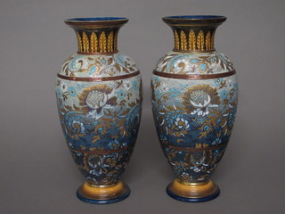 A pair of Doulton Lambeth salt glazed vases with blue and gilt decoration 12", 1 rim restored,