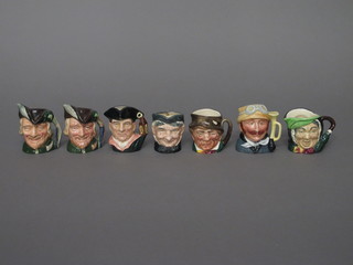 7 small Royal Doulton character jugs - Granny, Veteran  Motorist, 2 x Robin Hood, Night Watchman, Sarey Gamp, and Paddy