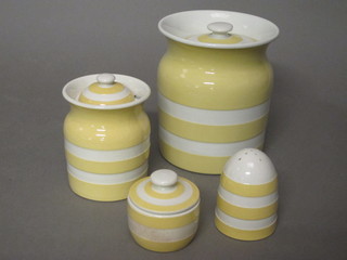 A circular yellow and white striped Cornishware kitchen storage  jar, the base with green shield mark 5", a do. preserve jar 3 1/2",  chip to rim, do. mustard pot 1" and pepper pot 2", no base