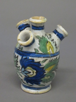 A Persian style pottery 4 spouted vase 6"