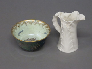 A Royal Worcester white glazed leaf shaped jug 4" together with  a Wedgwood green lustre bowl decorated dragons 4"