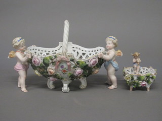 A Dresden style pierced porcelain basket supported by cherubs 10", slight crack, and a square Dresden style bowl decorated  cherubs