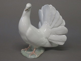A Lladro figure of a dove 7"