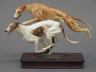 Albany, a limited edition figure group of 2 greyhounds, raised on a mahogany case 11"