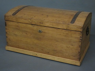 A 19th Century Continental dome stripped and polished pine  coffer with hinged lid and iron handles, 36"