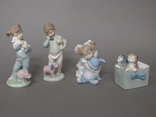 4 Nao figures - 2 kittens in a box 3", girl with a rabbit 5", standing girl with lamb and boy with teddybear 7"