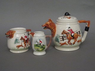 An Acorn china 3 piece pottery tea service decorated a fox  hunting scene