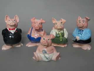 A set of 5 Wade Natwest piggy banks