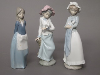 3 various Nao figures of standing ladies 9"