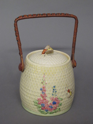 A 1930's Carltonware jar and cover in the form of honeycomb,  the finial in the form of a bee
