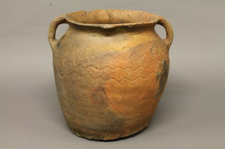 A terracotta twin handled urn 16"  ILLUSTRATED