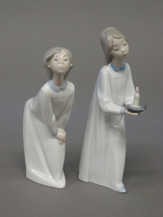 A Lladro figure of a crouching girl in nightgown 7" and 1 other girl with chamber stick 8"