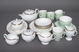 A 34 piece Wedgwood Cavendish pattern tea/dinner service comprising 4 dinner plates 11 1/2", 4 side plates 8", 4 tea plates  6", 4 pudding bowls, 4 soup bowls 9", boat shaped dish 10",  teapot, milk jug, sugar bowl, lidded sugar bowl 4 cups and 4  saucers, a 12 piece Wedgwood California pattern tea service with  teapot, twin handled sugar bowl, milk jug, 4 cups and 4 saucers,  boat shaped bowl 10" together with a 21 piece Minton green  glazed tea service with bread plate 9", sugar bowl, milk jug, 6  tea plates 6" - 1 chipped, 6 cups and 6 saucers