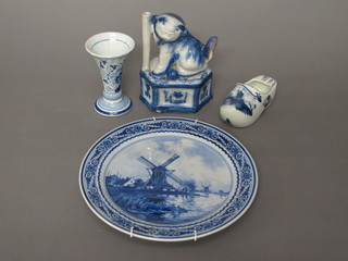 An Oriental blue and white figure of a seated Dog of Fo 7", a  Delft plate, do. model club and vase