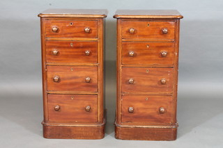 A pair of mahogany D shaped 4 drawer chests with tore handles  16"