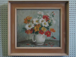 Oil on canvas, still life study "Jug of Daisies" indistinctly signed  to left hand corner, the reverse with Exmouth Art Group label  14" x 16"