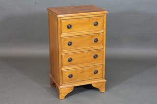 A Georgian style yew chest with crossbanded top, fitted 4 long drawers, raised on bracket feet 17"