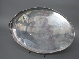 An oval silver plated twin handled galleried tea tray 24"