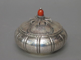A circular Danish planished silver jar and cover, the base with inscription, 7 ozs  ILLUSTRATED