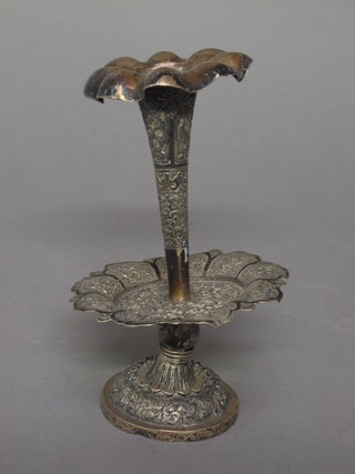 An embossed Eastern white metal table centre piece incorporating  a specimen vase 7"