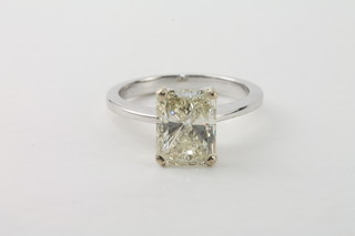 An 18ct white gold dress/engagement ring set a princess cut diamond, approx 2.51ct