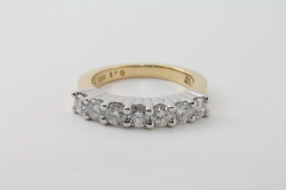 A lady's 18ct yellow gold dress ring set 7 diamonds, approx 1ct
