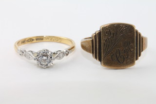 An 18ct gold dress ring set a diamond and a 9ct gold signet ring