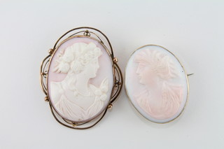 2 Victorian shell carved cameo portrait brooches of ladies  contained in gilt metal mounts