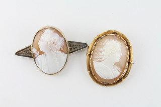 A shell carved cameo portrait brooch of a lady contained in a gilt metal mount and 1 other