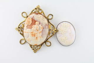 A shell carved cameo brooch decorated an interior scene contained in a gilt metal mount, a shell carved cameo portrait  brooch and a gilt metal brooch