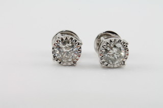 A pair of 18ct white gold diamond ear studs, approx 2ct in total, with screw backs