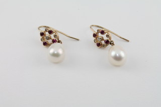 A pair of lady's ruby, pearl and diamond drop earrings