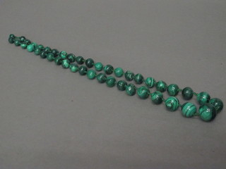 A string of "malachite" beads