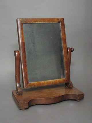 A Victorian rectangular bevelled plate dressing table mirror  contained in a mahogany swing frame 15"