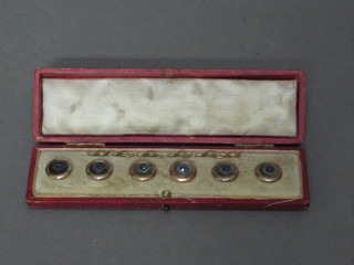 6 gilt metal dress studs, cased