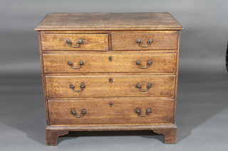 A Georgian oak chest of 2 short and 3 long drawers with brass  swan neck handles, raised on bracket feet 37"