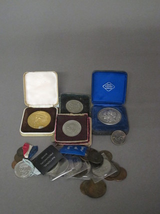 A collection of various crowns and coins