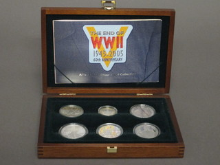 A set of 2005 Allied Forces silver proof coins, cased,