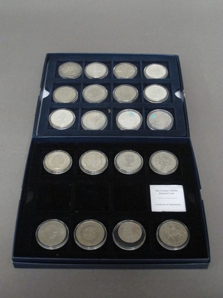 An 1891 Victorian silver crown, an 1899 Victorian silver crown,  a 2001 Bailiwick of Jersey silver proof ?5 coin, a 2009 silver  proof ?5 coin, a 2001 silver proof ?5 coin, two 2005 Falkland  Island crowns, two 2002 Falkland Island silver proof 50 pence  pieces, a 2009 Jersey silver proof ?5 coin, two 2009 silver proof  ?5 coins, a 2002 Turks and Caicos silver proof crown, a 2003  silver proof crown, two other silver proof crowns and 4 crowns