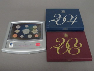 4 proof sets of coins - 2000, 2003, 2004 and 2005