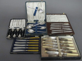 A set of 6 silver plated fish knives and forks, 5 silver plated tea knives and 1 other, 6 tea knives, 6 silver plated fruit spoons and  a set of 6 silver plated bean end coffee spoons, cased
