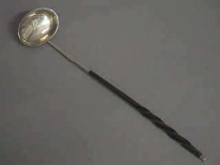 A George III silver toddy ladle with whale bone twist handle, London 1783